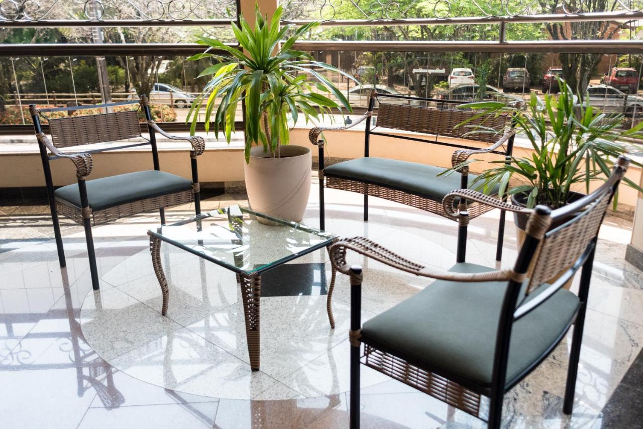 Holambra Garden Hotel Exterior photo Wrought iron furniture
