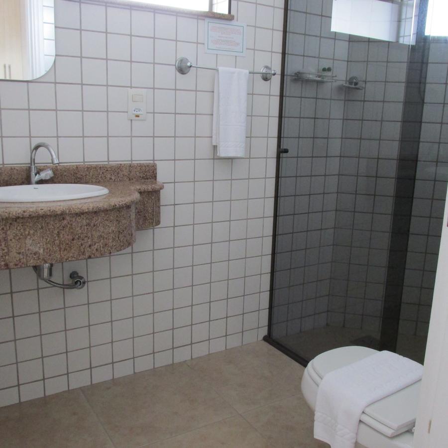 Holambra Garden Hotel Exterior photo Bathroom with shower cubicle